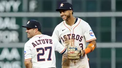 Jose Altuve #27 and Jeremy Peña #3 of the Houston Astros celebrate after their team defeated the New York Mets 3-1 on Opening Day at Daikin Park on March 27, 2025 in Houston, Texas.