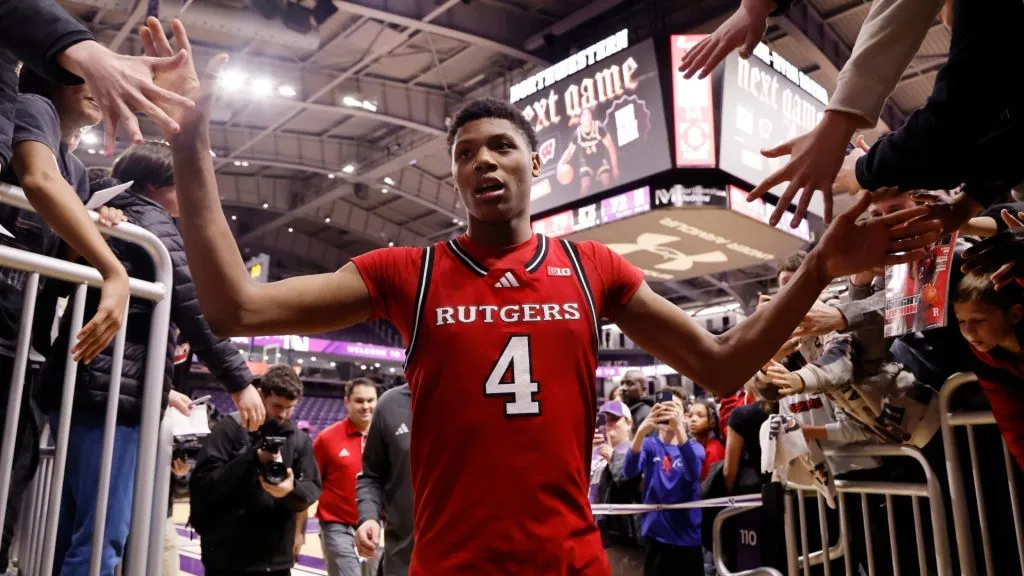 Ace Bailey #4 of the Rutgers Scarlet Knights high fives fans as he leaves the court after defeating the Northwestern Wildcats at Welsh-Ryan Arena on January 29, 2025. (Source: Michael Reaves/Getty Images)