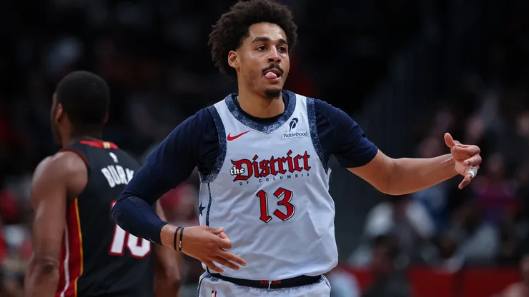 Jordan Poole #13 of the Washington Wizards celebrates after making a three point basket against the Miami Heat during the second half at Capital One Arena on March 31, 2025 in Washington, DC.