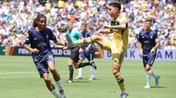 Alan Velasco #20 of CA Boca Juniors battles for possession with Dylan Manickum #10 of Auckland City FC