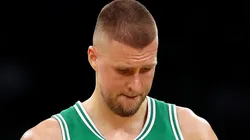 Kristaps Porzingis #8 of the Boston Celtics looks on during the game against the Orlando Magic at TD Garden on April 23, 2025 in Boston, Massachusetts.