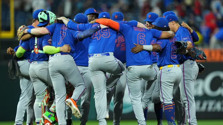 The New York Mets celebrate their win against the Philadelphia Phillies at Citizens Bank Park on June 21, 2025 in Philadelphia, Pennsylvania. The Mets defeated the Phillies 11-4.