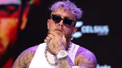 Jake Paul looks on during a press conference.
