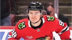 Connor Bedard #98 of the Chicago Blackhawks celebrates after assisting a goal by Tyler Bertuzzi #59 against the New York Rangers during the first period at the United Center on January 05, 2025 in Chicago, Illinois.