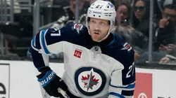 Nikolaj Ehlers #27 of the Winnipeg Jets passes during a 4-1 loss to the Los Angeles Kings at Crypto.com Arena on April 01, 2025 in Los Angeles, California.