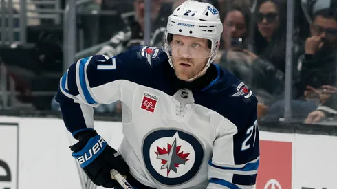 Nikolaj Ehlers #27 of the Winnipeg Jets passes during a 4-1 loss to the Los Angeles Kings at Crypto.com Arena on April 01, 2025 in Los Angeles, California.