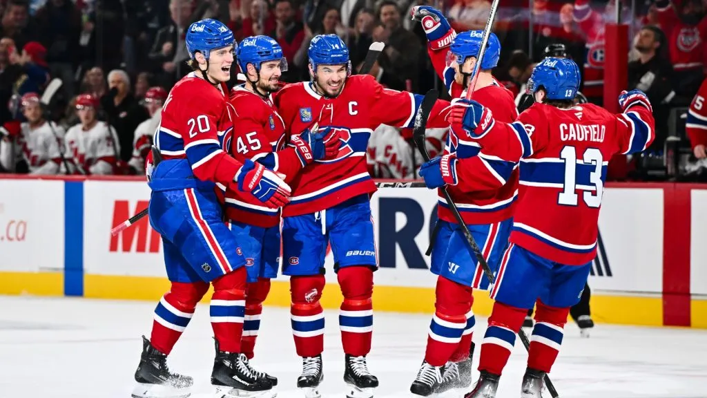 Nick Suzuki #14 of the Montreal Canadiens celebrates his goal with teammates during the second period against the Carolina Hurricanes on April 16, 2025. (Source: Minas Panagiotakis/Getty Images)