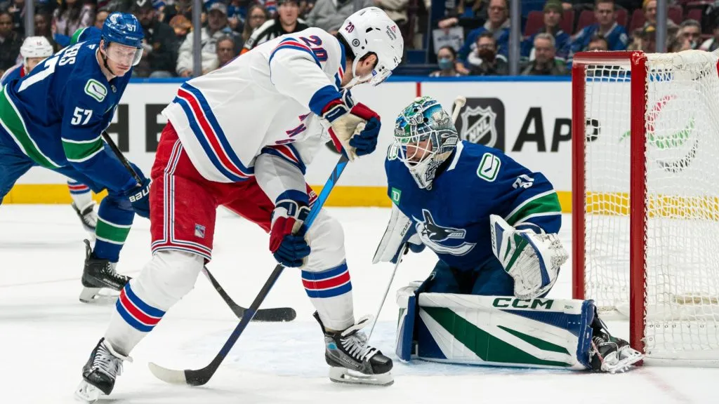 : Chris Kreider #20 of the New York Rangers shoots on goalie Arturs Silovs #31 of the Vancouver Canucks during the first period on November, 19, 2024 at Rogers Arena in Vancouver, British Columbia, Canada. (Photo by Rich Lam/Getty Images)