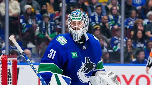 Arturs Silovs #31 of the Vancouver Canucks in net during the second period of their NHL game against the Calgary Flames at Rogers Arena on October 9, 2024 in Vancouver, British Columbia, Canada.
