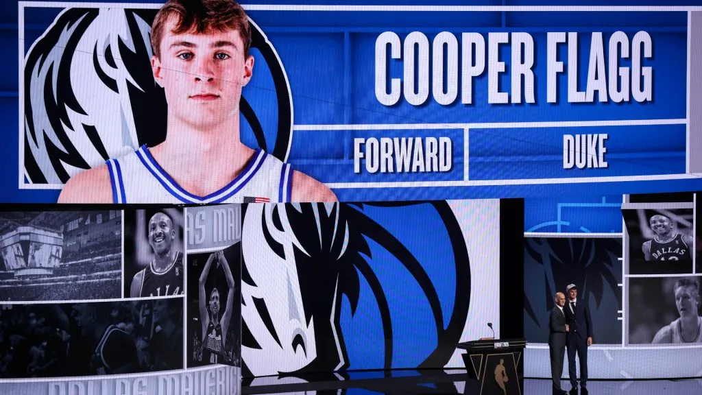 Cooper Flagg shakes hands with NBA commissioner Adam Silver after being drafted first overall by the Dallas Mavericks during the 2025 NBA Draft. (Mike Lawrie/Getty Images)