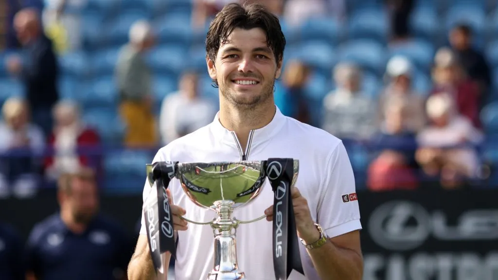 Taylor Fritz of United States poses for a photo with the Lexus Eastbourne Open Men’s Singles trophy following victory against Jenson Brooksby. (Charlie Crowhurst/Getty Images for LTA)