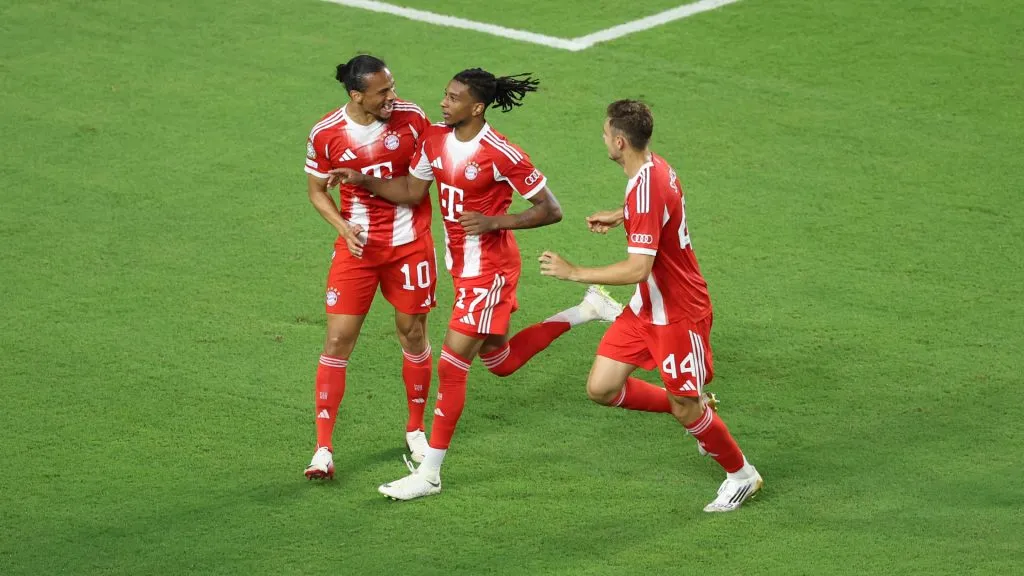 Michael Olise #17 of FC Bayern Munchen celebrates scoring his team’s second goal with teammates during the FIFA Club World Cup 2025 group C match against Boca Juniors. (Megan Briggs/Getty Images)
