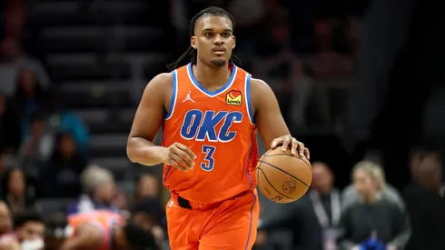 Dillon Jones #3 of the Oklahoma City Thunder brings the ball up court during the first half of the game against the Charlotte Hornets at Spectrum Center on December 28, 2024 in Charlotte, North Carolina.