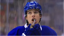 Mitchell Marner #16 of the Toronto Maple Leafs looks up to the scoreboard during an NHL preseason game against the Montreal Canadiens at Air Canada Centre on October 2, 2016 in Toronto, Canada.