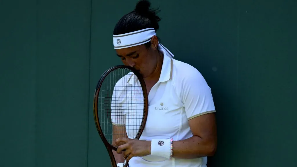 Ons Jabeur reacts during her first round match at 2024 SW19 (Hannah Peters/Getty Images)