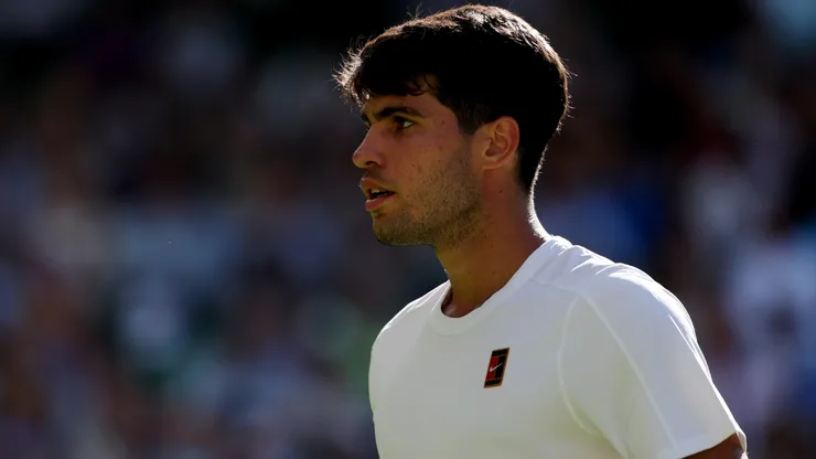 Carlos Alcaraz of Spain reacts against Fabio Fognini of Italy during the Gentlemen's Singles first round match on day one of The Championships Wimbledon 2025 at All England Lawn Tennis and Croquet Club on June 30, 2025 in London, England.