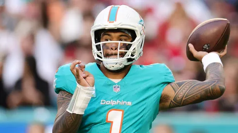 Tua Tagovailoa #1 of the Miami Dolphins looks to pass against the San Francisco 49ers at Hard Rock Stadium on December 22, 2024 in Miami Gardens, Florida.