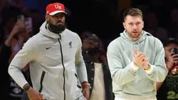 Luka Doncic #77 and LeBron James #23 of the Los Angeles Lakers look on during the fourth quarter of a game against the Indiana Pacers at Crypto.com Arena on February 08, 2025 in Los Angeles, California.