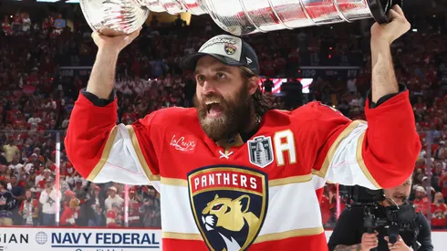 Aaron Ekblad #5 of the Florida Panthers celebrates with the Stanley Cup following the Cup win against the Edmonton Oilers in Game Six of the 2025 NHL Stanley Cup Final at Amerant Bank Arena on June 17, 2025 in Sunrise, Florida.