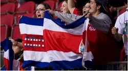 Costa Rican fans hold their contry's flag