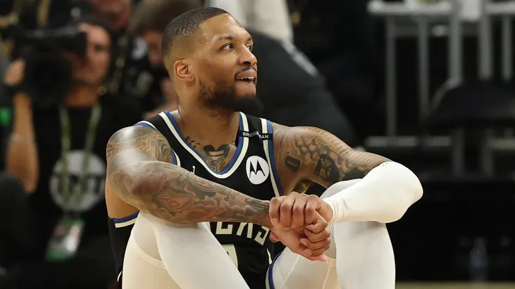 Damian Lillard #0 of the Milwaukee Bucks reacts from the court after an apparent injury during the first quarter in Game Four of the Eastern Conference First Round NBA Playoffs against the Indiana Pacers