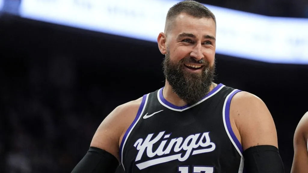 Jonas Valanciunas #17 of the Sacramento Kings smiles after making a basket in the fourth quarter against the Phoenix Suns at Golden 1 Center on April 13, 2025 in Sacramento, California.