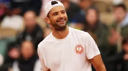 Grigor Dimitrov of Bulgaria reacts while he is practising with Jannik Sinner of Italy at Roland Garros on May 24, 2025.