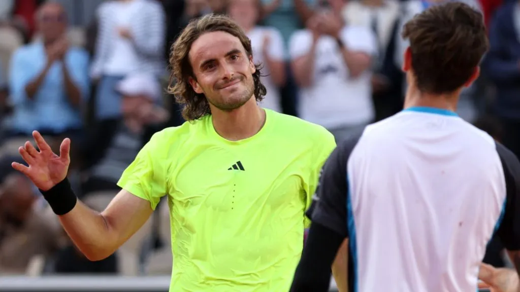 Stefanos Tsitsipas of Greece greets Matteo Gigante of Italy greets at the net after his defeat in the Men’s Singles Second Round match on Day Four of the 2025 French Open. (Source: Adam Pretty/Getty Images)