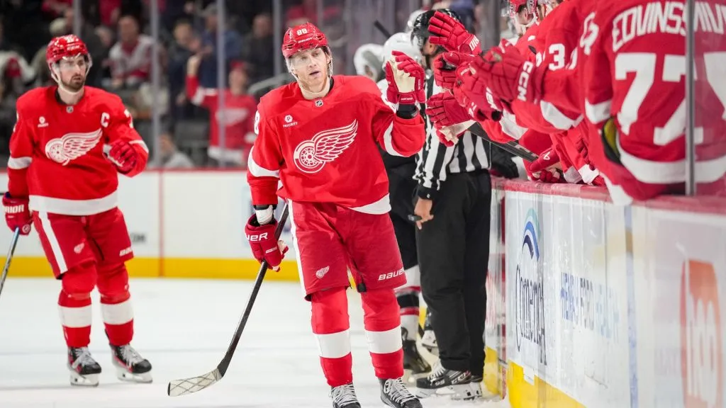 Patrick Kane #88 of the Detroit Red Wings high fives teammates after scoring a goal against the Ottawa Senators during the third period at Little Caesars Arena on March 27, 2025 in Detroit, Michigan. (Photo by Nic Antaya/Getty Images)