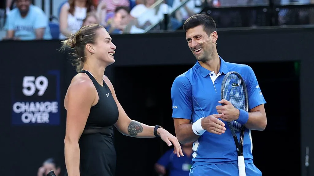 Aryna Sabalenka and Novak Djokovic during charity match ahead of the 2024 Australian Open ( Kelly Defina/Getty Images)