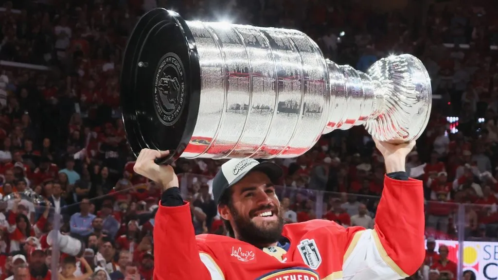 Jaycob Megna #6 of the Florida Panthers celebrates with the Stanley Cup following the Cup win against the Edmonton Oilers in Game Six of the 2025 NHL Stanley Cup Final at Amerant Bank Arena on June 17, 2025 in Sunrise, Florida.