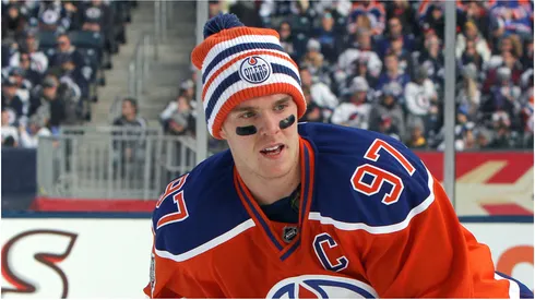 Connor McDavid #97 of the Edmonton Oilers warms up before action against the Winnipeg Jets during the 2016 Tim Hortons NHL Heritage Classic hockey game on October 23, 2016 at Investors Group Field in Winnipeg, Manitoba, Canada.