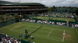 A general view over Court 14 as Leylah Fernandez of Canada serves against Laura Siegemund of Germany during the Ladies' Singles second round match on day three of The Championships Wimbledon 2025.