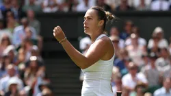 Aryna Sabalenka celebrates winning match point against Marie Bouzkova of Czechia during the Ladies' Singles second round match on day three of The Championships Wimbledon 2025 at All England Lawn Tennis and Croquet Club on July 02, 2025 in London, England.