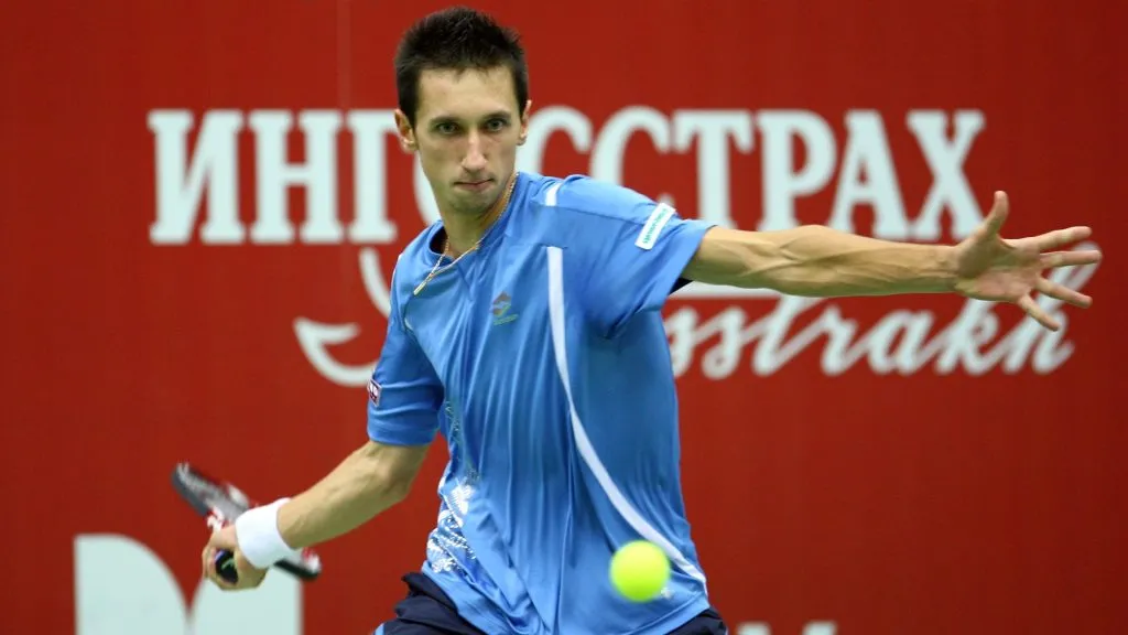 Sergiy Starkhovsky of Ukraine in action against Paul-Henri Mathieu of France during day three of the Kremlin Cup Tennis at the Olympic Stadium on October 8, 2008. (Source: Julian Finney/Getty Images)