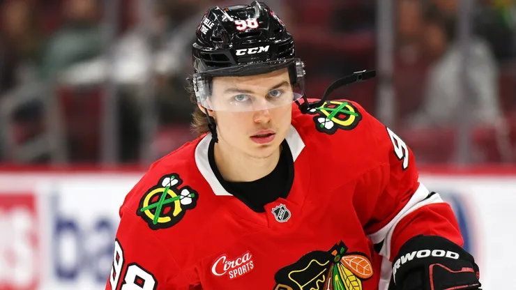 Connor Bedard of the Chicago Blackhawks awaits a faceoff during the 2024–25 regular season. The star center is now eligible to re-sign and begin a new chapter with the franchise.