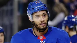 The Hurricanes traded for the 6-foot-5 defenseman and signed him long-term to reshape their blue line.