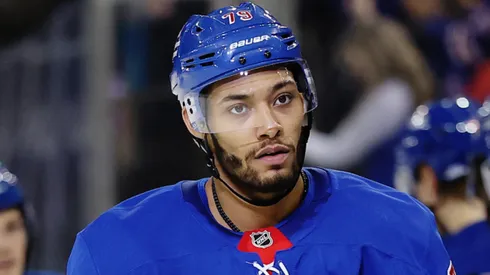 The Hurricanes traded for the 6-foot-5 defenseman and signed him long-term to reshape their blue line.