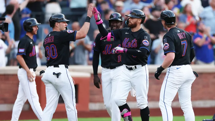 Brandon Nimmo #9 of the New York Mets celebrates with teammates after hitting a grand slam during the second inning of Game Two of a doubleheader against the Milwaukee Brewers at Citi Field on July 02, 2025 in the Queens borough of New York City.