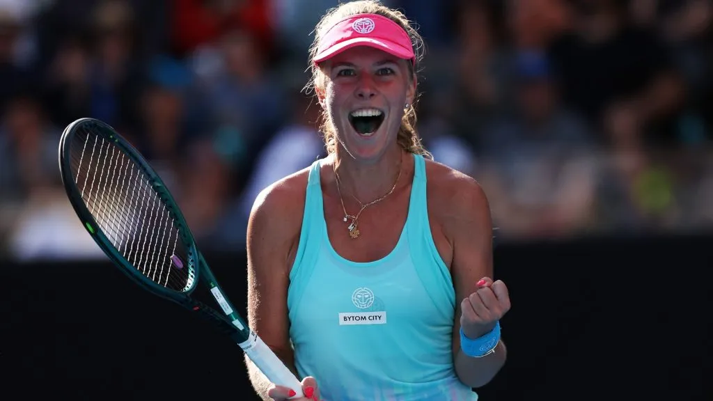 Magdalena Frech of Poland celebrates winning match point in their round three singles match against Anastasia Zakharova during the 2024 Australian Open. (Source: Julian Finney/Getty Images)