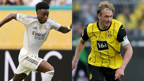 Vinicius Junior #7 of Real Madrid C. F. and Julian Brandt of Borussia Dortmund.