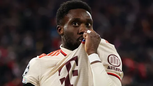 Alphonso Davies of Bayern Munich celebrates scoring his team's first goal during the UEFA Champions League 2024/25 League Knockout Play-off second leg match between FC Bayern München and Celtic FC at Allianz Arena on February 18, 2025 in Munich, Germany.