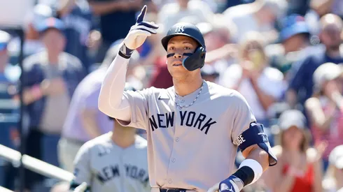 Aaron Judge #99 of the New York Yankees reacts at home plate after his first inning home run against the New York Mets at Citi Field on July 04, 2025 in New York City.