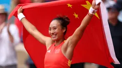 Qinwen Zheng of Team People’s Republic of China celebrates match point during the Tennis Women's Singles Gold Medal match against Donna Vekic of Team Croatia on day eight of the Olympic Games Paris 2024.
