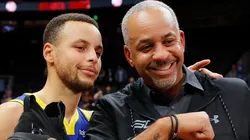 Stephen Curry #30 of the Golden State Warriors poses with his dad Dell Curry