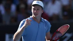 Jenson Brooksby of the United States reacts during the third round singles match against Tommy Paul of the United States during day six of the 2023 Australian Open.