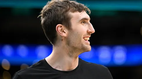 Luke Kornet #40 of the Boston Celtics watches warmups before Game five of round two of the NBA playoffs against the New York Knicks at the TD Garden on May 14, 2025 in Boston, Massachusetts. NOTE TO USER: User expressly acknowledges and agrees that, by downloading and or using this photograph, User is consenting to the terms and conditions of the Getty Images License Agreement.