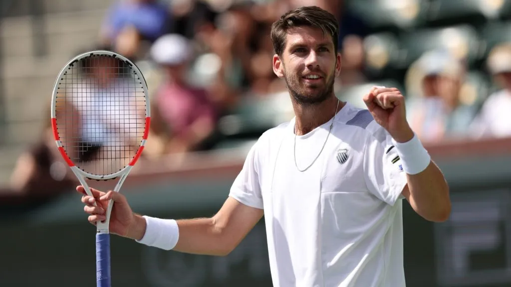 Cameron Norrie of Great Britain celebrates match point against Lorenzo Sonego of Italy in their second round match during the BNP Paribas Open in 2024. (Source: Clive Brunskill/Getty Images)