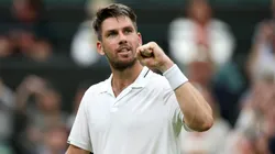 Cameron Norrie of Great Britain celebrates winning match point against Tomas Machac of Czech Republic in the Men's Singles first round match during day two of The Championships Wimbledon 2023.