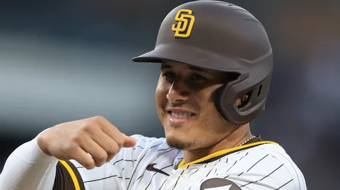 Manny Machado #13 of the San Diego Padres reacts at first base after connecting for a single during the fourth inning of a game against the Arizona Diamondbacks at Petco Park on July 07, 2025 in San Diego, California. This was Machado's 2000th career base hit.